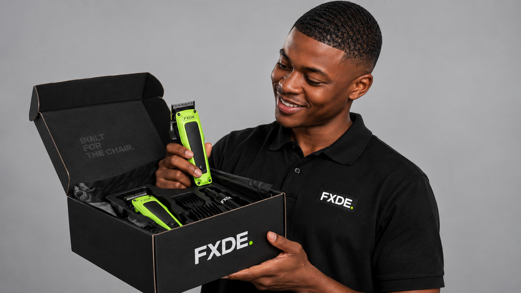 Barber opening a delivered FXDE box of tools