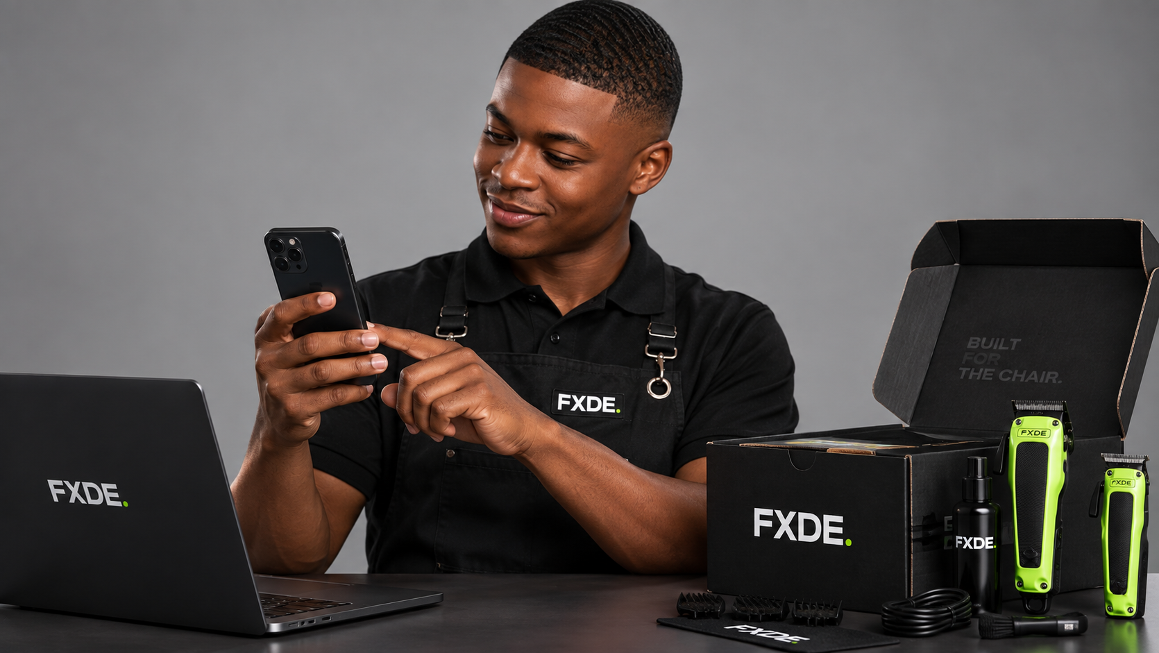Barber placing an FXDE order on his phone